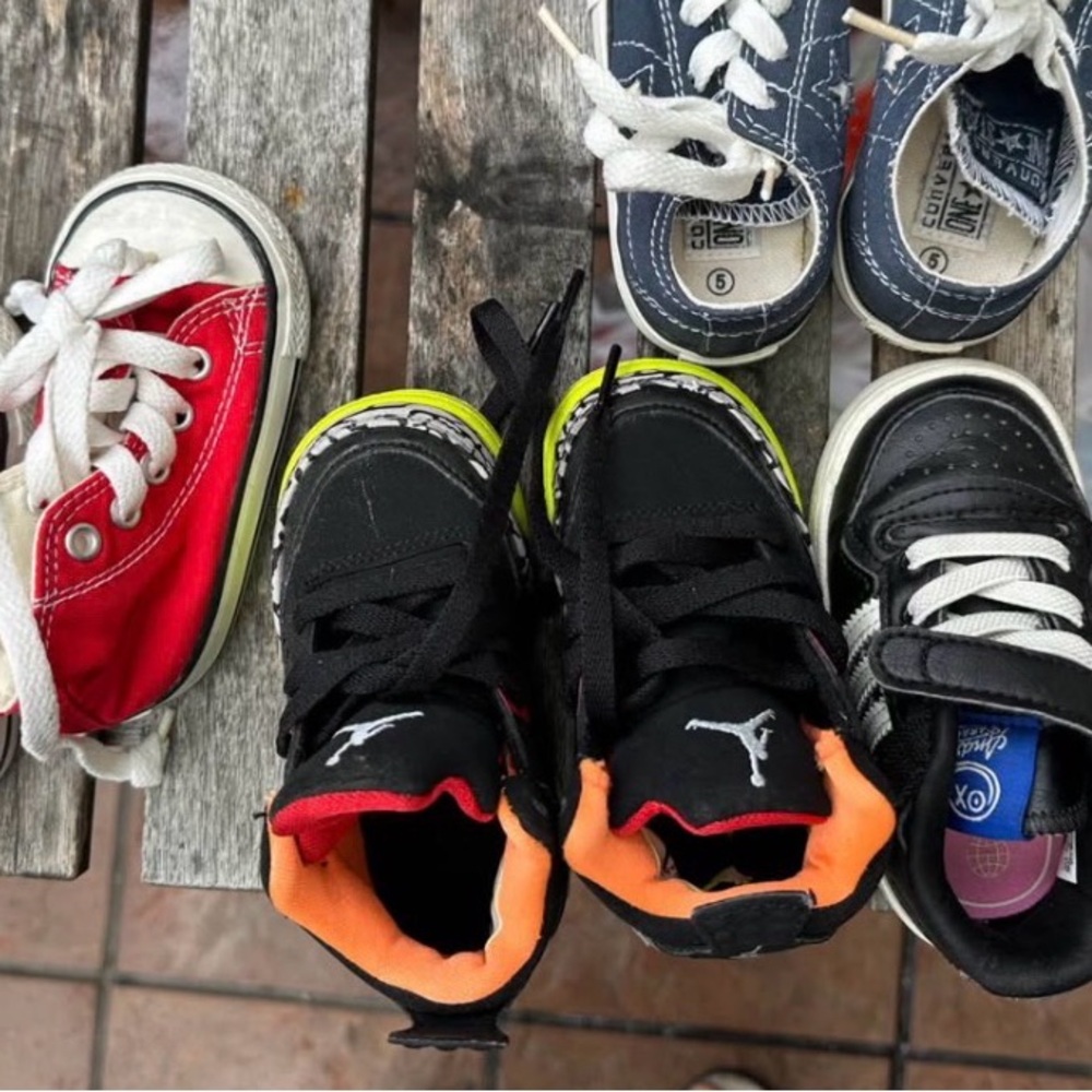 Kids Black and Orange Nike Sneakers